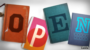 Four differently colored books laid haphazardly on a white surface with each book having a large uppercase letter on its covers so the four together spell out OPEN.