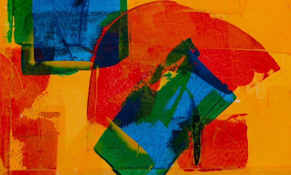 Photo of Abstract Art including paint strokes of orange, blue, green and red.